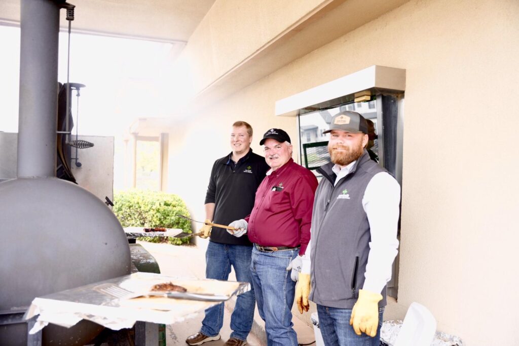 FCWO Staff standing by the grill