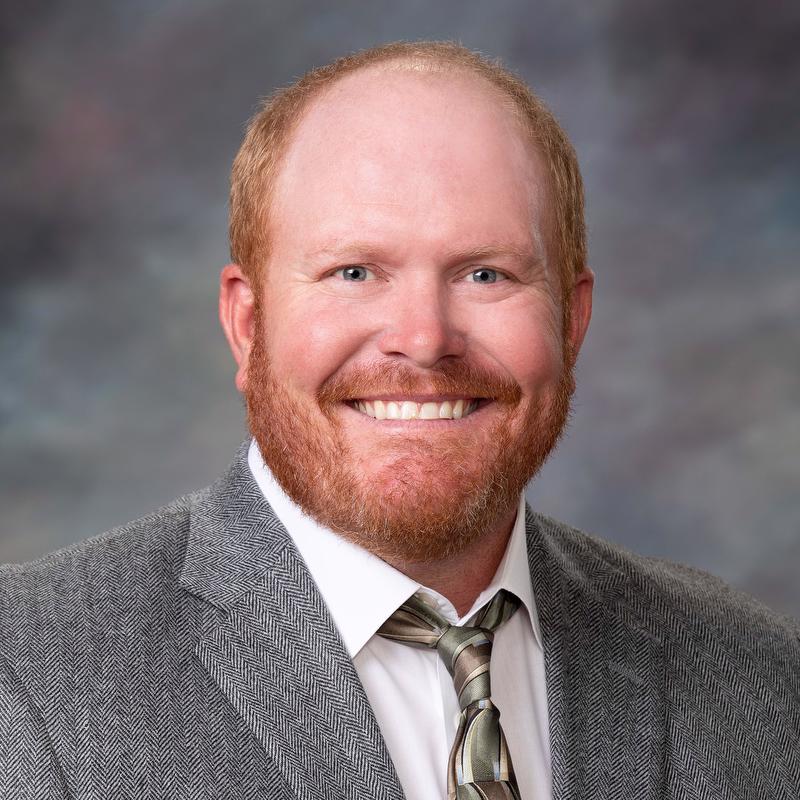 kyle carothers headshot