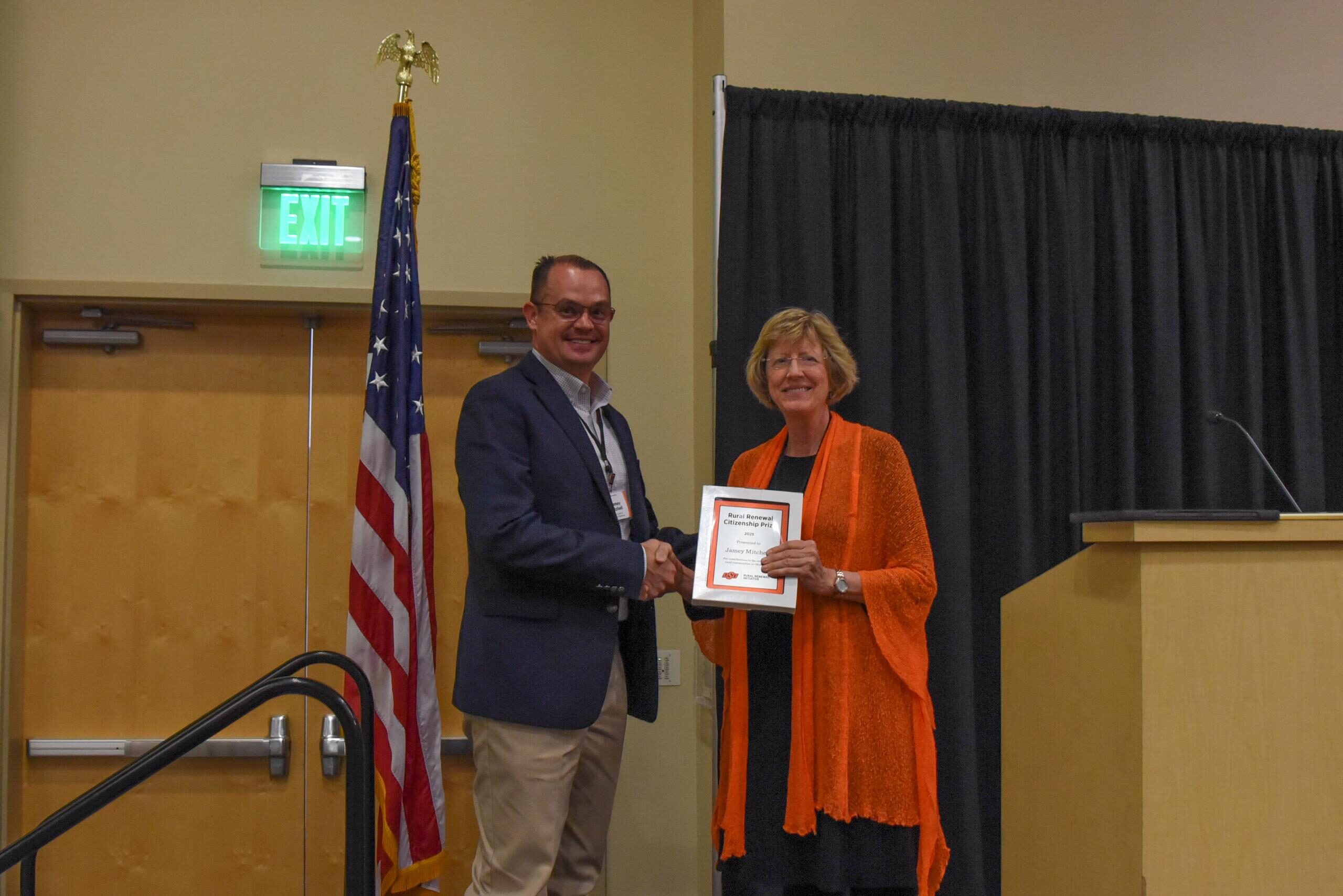 Jamey Mitchell receiving award